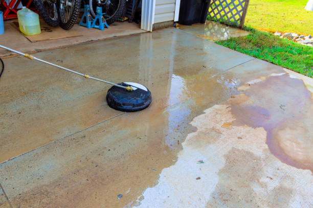 Clean residential concrete driveway after professional pressure washing