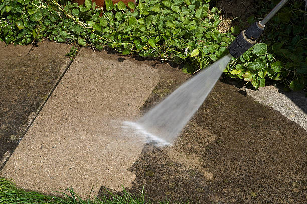 Clean concrete walkway after professional pressure washing