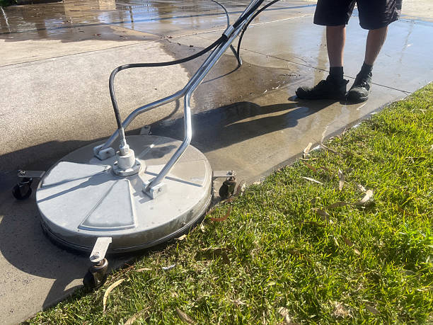 Clean commercial storefront sidewalk after professional pressure washing